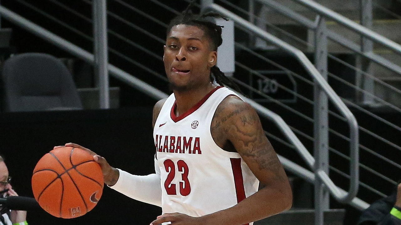 ATLANTA, GA - DECEMBER 12: Alabama Crimson Tide guard John Petty Jr. (23) during the game between the Clemson Tigers and the Alabama Crimson Tide on December 12, 2020 at State Farm Arena in Atlanta, Georgia.