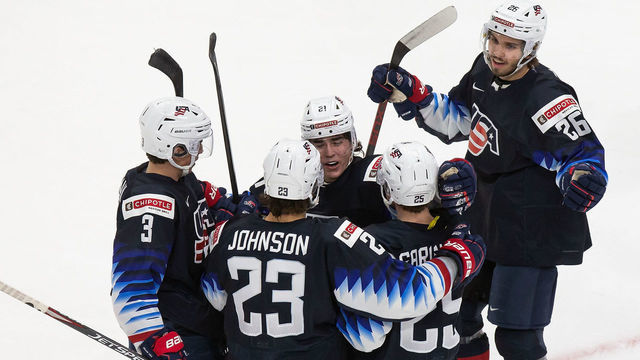 EDMONTON, AB - JANUARY 02: Henry Thrun #3, Ryan Johnson #23, Brett Berard #21, John Farinacci #25 and Landon Slaggert #26 of the United States celebrate a gal against Slovakia during the 2021 IIHF World Junior Championship quarterfinals at Rogers Place on January 2, 2021 in Edmonton, Canada.