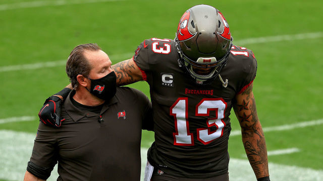 TAMPA, FLORIDA - JANUARY 03: Mike Evans #13 of the Tampa Bay Buccaneers is injured during a game against the Atlanta Falcons at Raymond James Stadium on January 03, 2021 in Tampa, Florida.