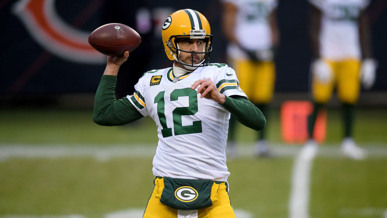 CHICAGO, ILLINOIS - JANUARY 03: Aaron Rodgers #12 of the Green Bay Packers warms up prior to the game against the Chicago Bears at Soldier Field on January 03, 2021 in Chicago, Illinois.