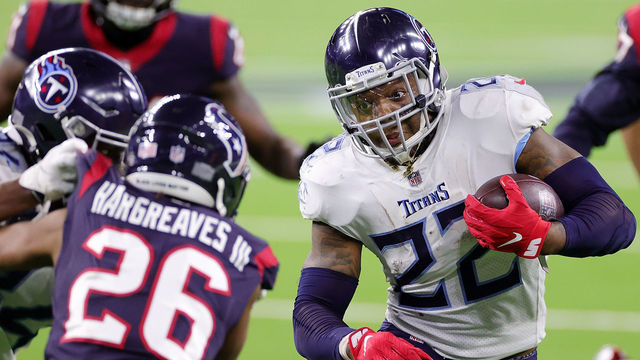 HOUSTON, TEXAS - JANUARY 03: Derrick Henry #22 of the Tennessee Titans runs for yards during the second half of a game against the Houston Texans at NRG Stadium on January 03, 2021 in Houston, Texas.