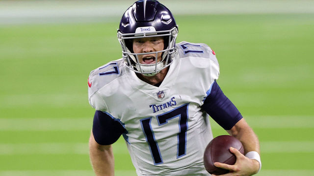HOUSTON, TEXAS - JANUARY 03: Ryan Tannehill #17 of the Tennessee Titans runs for yards during the second half of a game against the Houston Texans at NRG Stadium on January 03, 2021 in Houston, Texas.