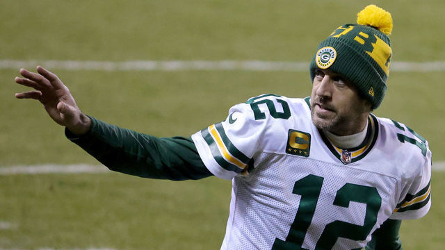 CHICAGO, ILLINOIS - JANUARY 03: Aaron Rodgers #12 of the Green Bay Packers waves after defeating the Chicago Bears in the game at Soldier Field on January 03, 2021 in Chicago, Illinois.
