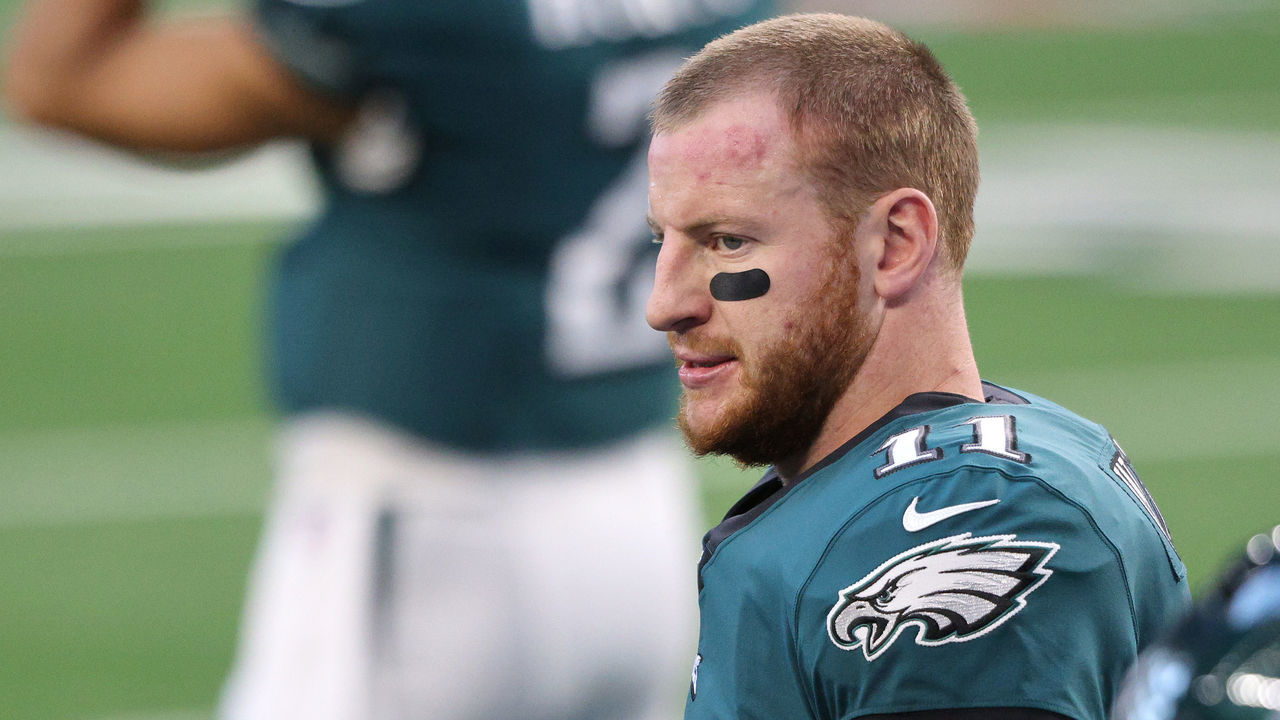ARLINGTON, TEXAS - DECEMBER 27: Carson Wentz #11 of the Philadelphia Eagles looks on before the game against the Dallas Cowboys at AT&T Stadium on December 27, 2020 in Arlington, Texas.