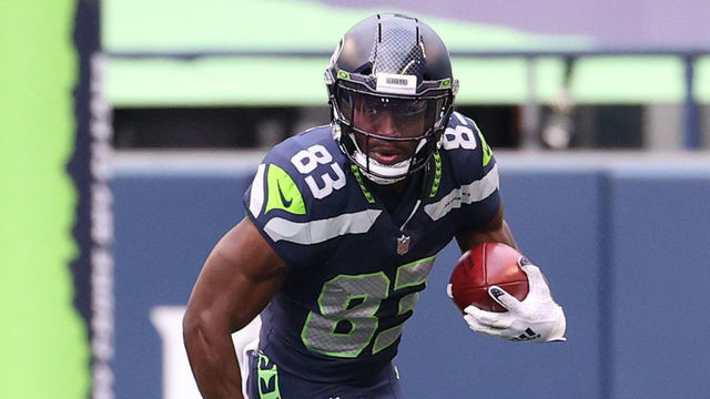 SEATTLE, WASHINGTON - DECEMBER 06: David Moore #83 of the Seattle Seahawks runs with the ball in the second quarter against the New York Giants at Lumen Field on December 06, 2020 in Seattle, Washington.