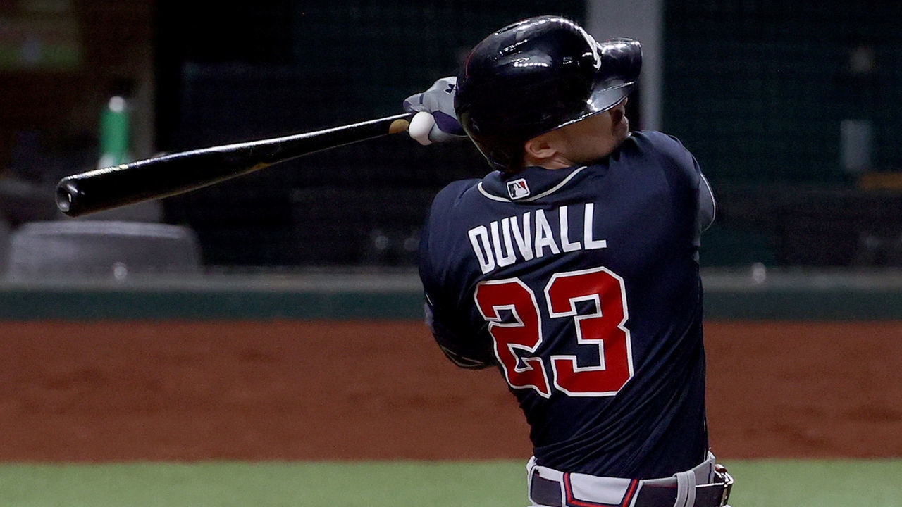 ARLINGTON, TEXAS - OCTOBER 12: Adam Duvall #23 of the Atlanta Braves injures himself while hitting a foul ball against the Los Angeles Dodgers during the second inning in Game One of the National League Championship Series at Globe Life Field on October 12, 2020 in Arlington, Texas.