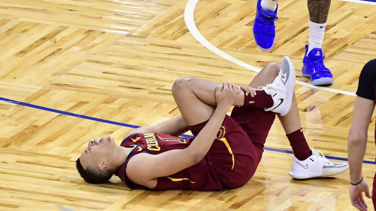 ORLANDO, FLORIDA - JANUARY 04: Dante Exum #1 of the Cleveland Cavaliers reacts to an injury in the first half against the Orlando Magic at Amway Center on January 04, 2021 in Orlando, Florida.