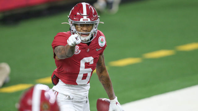 ARLINGTON, TX - JANUARY 01: Alabama Crimson Tide wide receiver DeVonta Smith (6) celebrates after scoring a touchdown during the College Football Playoff Semifinal Rose Bowl Game between Notre Dame and Alabama on January 1, 2021 at AT&T Stadium in Arlington, TX.