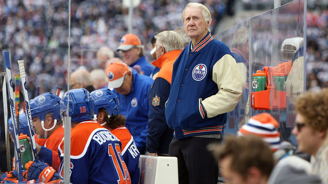 WINNIPEG, MANITOBA - OCTOBER 22: Coach John Muckler of the Edmonton Oilers alumni watches his team take on the Winnipeg Jets alumni during the 2016 Tim Hortons NHL Heritage Classic alumni hockey game on October 22, 2016 at Investors Group Field in Winnipeg, Manitoba, Canada.