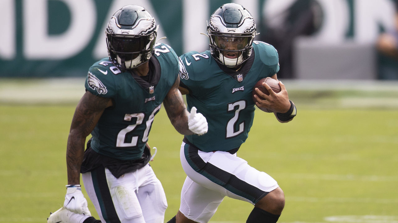 PHILADELPHIA, PA - SEPTEMBER 27: Jalen Hurts #2 of the Philadelphia Eagles runs the ball as Miles Sanders #26 blocks for him against the Cincinnati Bengals at Lincoln Financial Field on September 27, 2020 in Philadelphia, Pennsylvania.