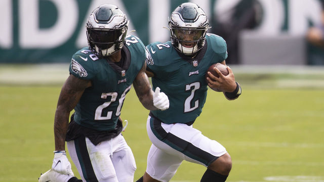 PHILADELPHIA, PA - SEPTEMBER 27: Jalen Hurts #2 of the Philadelphia Eagles runs the ball as Miles Sanders #26 blocks for him against the Cincinnati Bengals at Lincoln Financial Field on September 27, 2020 in Philadelphia, Pennsylvania.