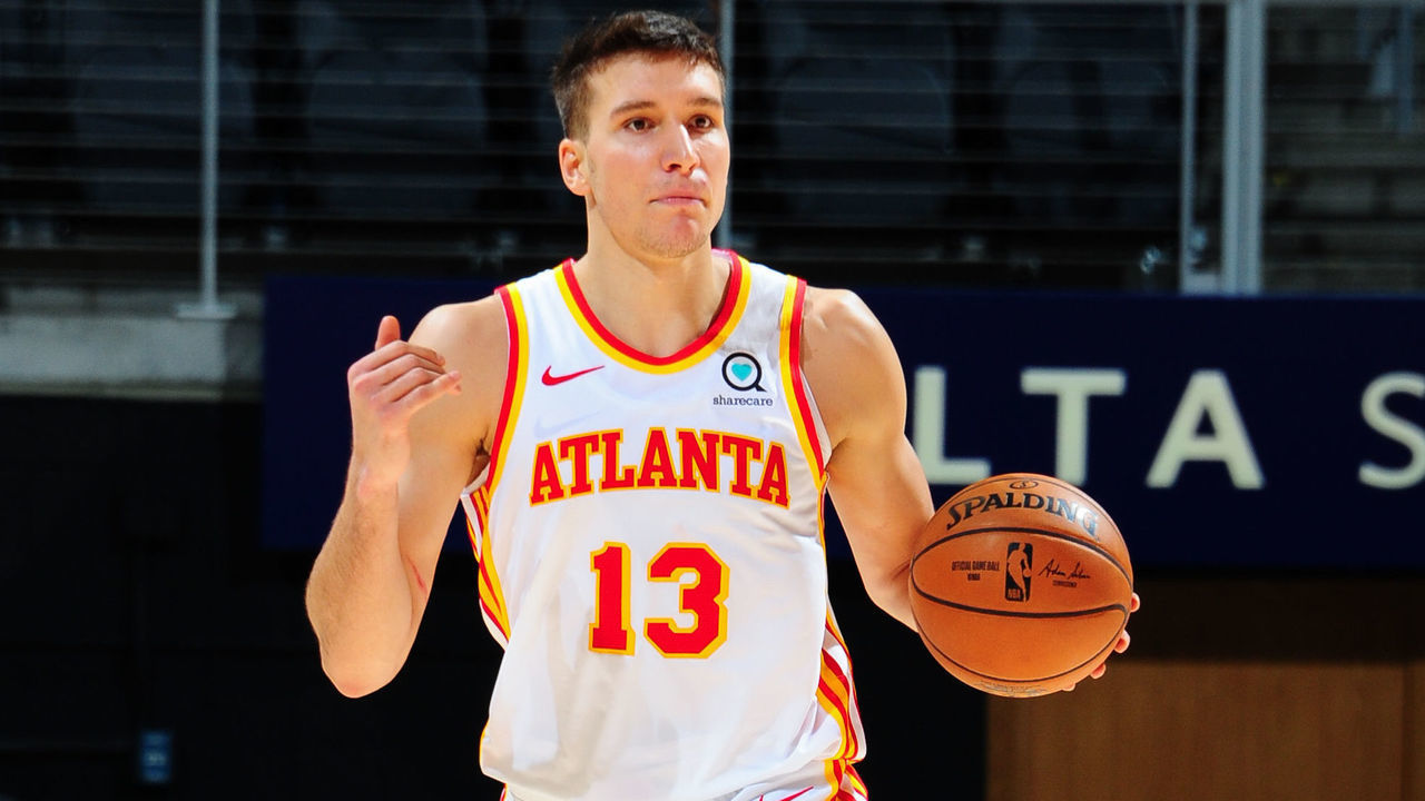 ATLANTA, GA - JANUARY 2: Bogdan Bogdanovic #13 of the Atlanta Hawks dribbles during the game against the Cleveland Cavaliers on January 2, 2021 at State Farm Arena in Atlanta, Georgia. NOTE TO USER: User expressly acknowledges and agrees that, by downloading and/or using this Photograph, user is consenting to the terms and conditions of the Getty Images License Agreement. Mandatory Copyright Notice: Copyright 2021 NBAE