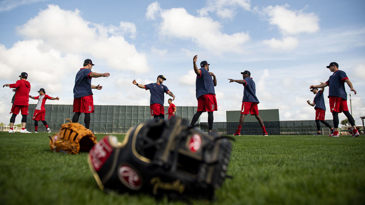 FT. MYERS, FL - FEBRUARY 12: Members of the Boston Red Sox stretch during a team workout on February 12, 2020 at JetBlue Park at Fenway South in Fort Myers, Florida.