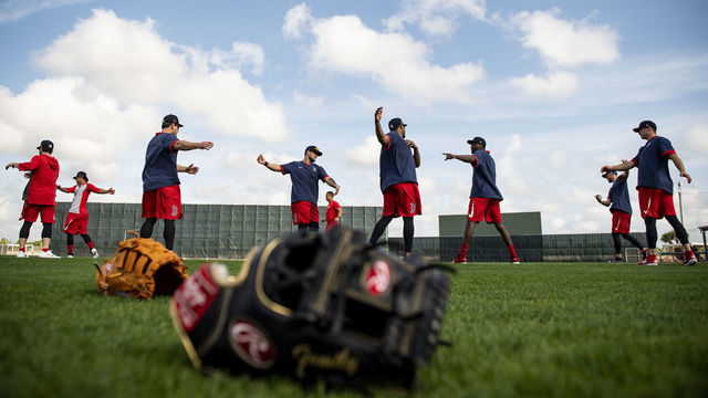 FT. MYERS, FL - FEBRUARY 12: Members of the Boston Red Sox stretch during a team workout on February 12, 2020 at JetBlue Park at Fenway South in Fort Myers, Florida.
