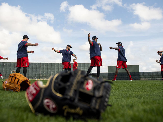 FT. MYERS, FL - FEBRUARY 12: Members of the Boston Red Sox stretch during a team workout on February 12, 2020 at JetBlue Park at Fenway South in Fort Myers, Florida.
