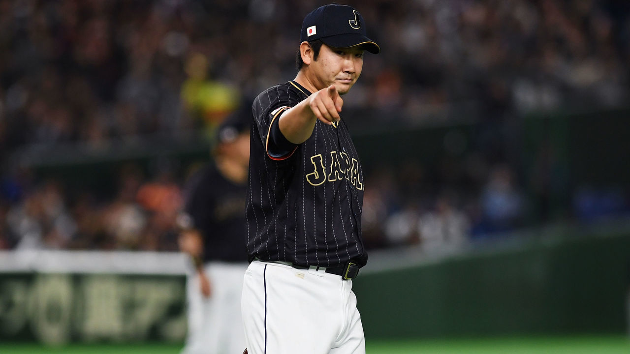 TOKYO, JAPAN - MARCH 08: Starting Pitcher Tomoyuki Sugano #11 of Japan reacts in the bottom of the second inning during the World Baseball Classic Pool B Game Three between Japan and Australia at Tokyo Dome on March 8, 2017 in Tokyo, Japan.