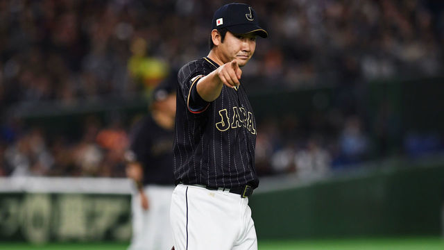 TOKYO, JAPAN - MARCH 08: Starting Pitcher Tomoyuki Sugano #11 of Japan reacts in the bottom of the second inning during the World Baseball Classic Pool B Game Three between Japan and Australia at Tokyo Dome on March 8, 2017 in Tokyo, Japan.