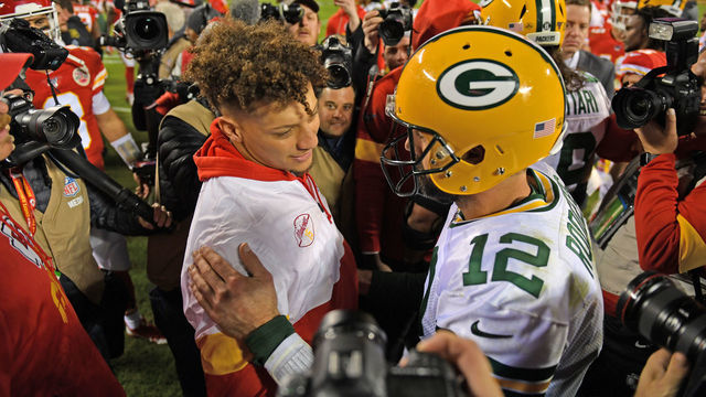 KANSAS CITY, MO - OCTOBER 27: Quarterback Aaron Rodgers #12 of the Green Bay Packers meets with quarterback Patrick Mahomes (L) of the Kansas City Chiefs after the game at Arrowhead Stadium on October 27, 2019 in Kansas City, Missouri.