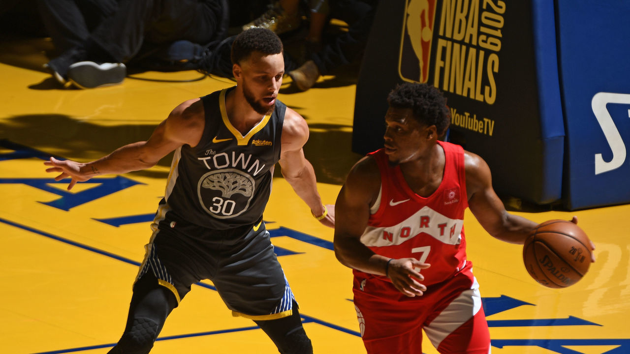 OAKLAND, CA - JUNE 13: Stephen Curry #30 of the Golden State Warriors guards Kyle Lowry #7 of the Toronto Raptors during Game Six of the NBA Finals on June 13, 2019 at Oracle Arena in Oakland, California. NOTE TO USER: User expressly acknowledges and agrees that, by downloading and/or using this photograph, user is consenting to the terms and conditions of the Getty Images License Agreement. Mandatory Copyright Notice: Copyright 2019 NBAE
