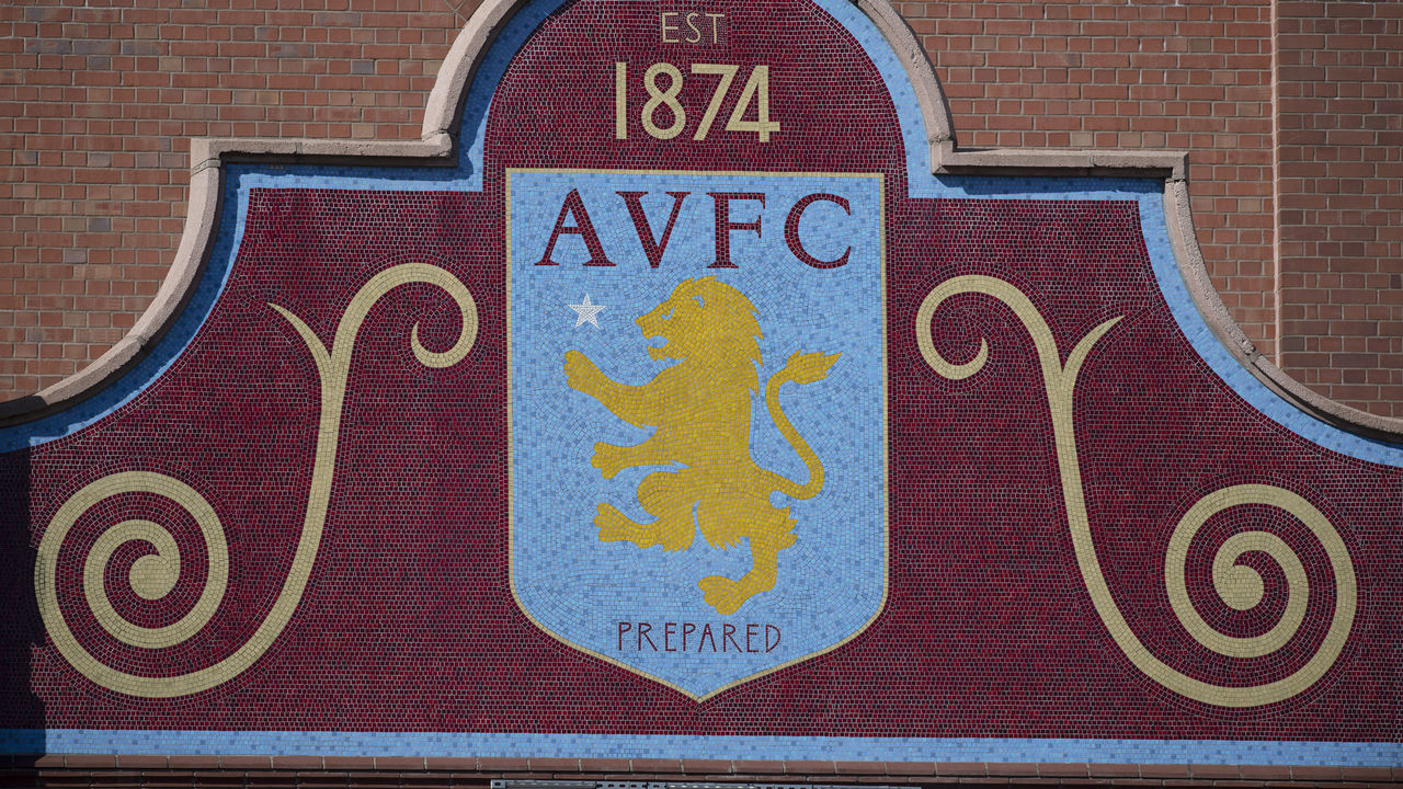 BIRMINGHAM, ENGLAND - MARCH 23: Aston Villa club crest featuring the The Rampant Lion of Scotland hallmark on the outside of the Holte End at Villa Park, home of Aston Villa FC on March 23, 2020 in Birmingham, United Kingdom.