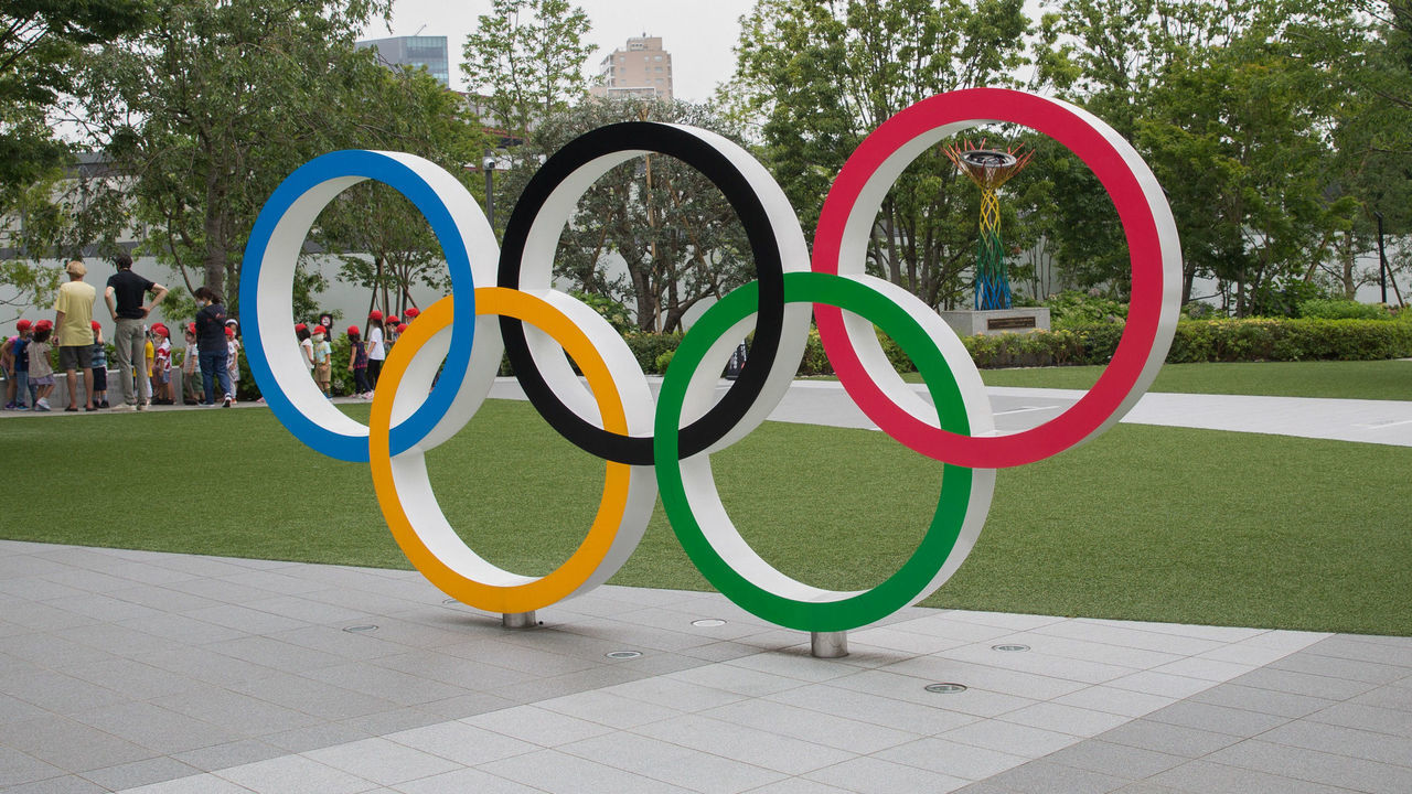 TOKYO, JAPAN - 2020/07/21: Olympic Rings in front of Japan Olympic Museum in Shinjuku. Due to the Covid-19 outbreak, the Olympic Games Tokyo 2020 were postponed for the first time in history. The Opening Ceremony of the Olympic Games Tokyo 2020 will now be held on 23rd July 2021 instead of 24 July 2020.