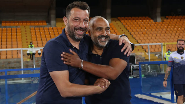 LECCE, ITALY - AUGUST 02: Head coach of Parma, Roberto D'Aversa (L) hugs Fabio Liverani, head coach of Lecce during the Serie A match between US Lecce and Parma Calcio at Stadio Via del Mare on August 02, 2020 in Lecce, Italy.