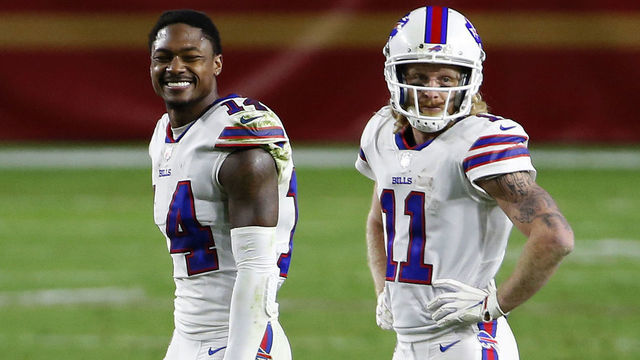 GLENDALE, ARIZONA - DECEMBER 07: Wide receivers Stefon Diggs #14 and Cole Beasley #11 of the Buffalo Bills joke with cornerback Dontae Johnson #27 of the San Francisco 49ers during the second half of the NFL football game at State Farm Stadium on December 07, 2020 in Glendale, Arizona.
