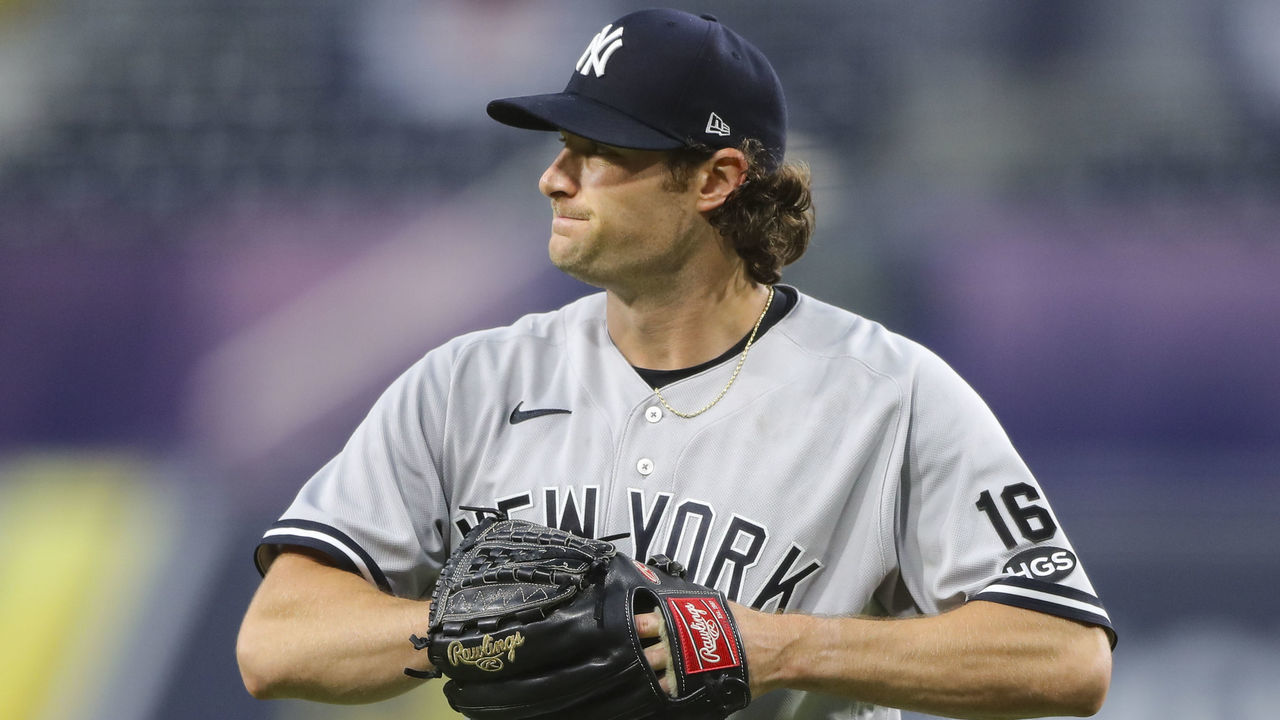 SAN DIEGO, CA - OCTOBER 09: Gerrit Cole #45 of the New York Yankees walks to the dugout after being replaced in the sixth inning during Game 5 of the ALDS between the New York Yankees and the Tampa Bay Rays at Petco Park on Friday, October 9, 2020 in San Diego, California.