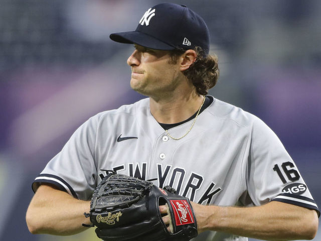 SAN DIEGO, CA - OCTOBER 09: Gerrit Cole #45 of the New York Yankees walks to the dugout after being replaced in the sixth inning during Game 5 of the ALDS between the New York Yankees and the Tampa Bay Rays at Petco Park on Friday, October 9, 2020 in San Diego, California.