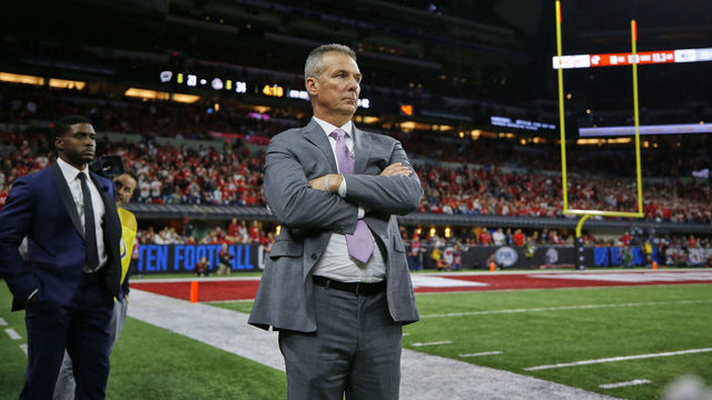 College Football: Big Ten Championship Game: Former Ohio State coach and current Big Ten Network analyst Urban Meyer on sidelines before Wisconsin vs Ohio State game at Lucas Oil Stadium. Indianapolis, IN 12/7/2019 CREDIT: Jeff Haynes (Set Number: X163093 TK1 )