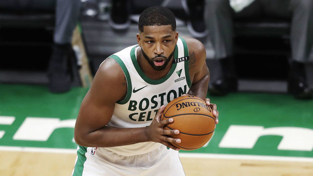BOSTON, MASSACHUSETTS - DECEMBER 25: Tristan Thompson #13 of the Boston Celtics looks to pass during the first quarter of the game against the Brooklyn Nets at TD Garden on December 25, 2020 in Boston, Massachusetts.