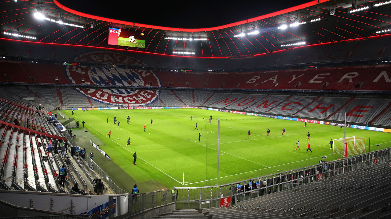 MUNICH, GERMANY - DECEMBER 09: General view inside the stadium as the two teams warm up prior to the UEFA Champions League Group A stage match between FC Bayern Muenchen and Lokomotiv Moskva at Allianz Arena on December 09, 2020 in Munich, Germany. Sporting stadiums around Germany remain under strict restrictions due to the Coronavirus Pandemic as Government social distancing laws prohibit fans inside venues resulting in games being played behind closed doors.