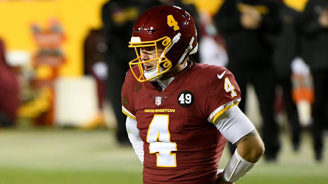 LANDOVER, MARYLAND - DECEMBER 27: Taylor Heinicke #4 of the Washington Football Team looks on against the Carolina Panthers during the game at FedExField on December 27, 2020 in Landover, Maryland.
