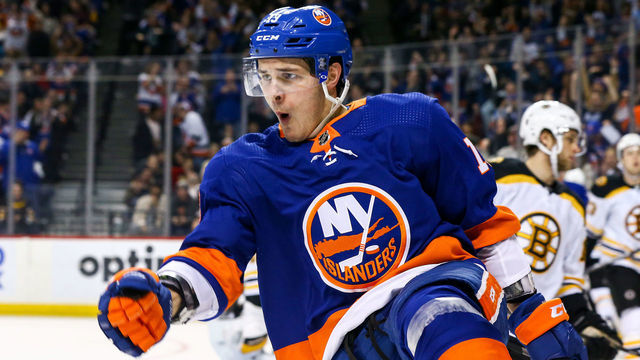 NEW YORK, NEW YORK - JANUARY 11: Mathew Barzal #13 of the New York Islanders celebrates his third period goal against the Boston Bruins at Barclays Center on January 11, 2020 in New York City.