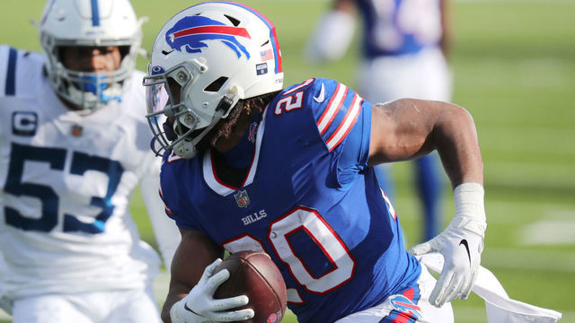 ORCHARD PARK, NEW YORK - JANUARY 09: Zack Moss #20 of the Buffalo Bills runs the ball during the first half of the AFC Wild Card playoff game against the Indianapolis Colts at Bills Stadium on January 09, 2021 in Orchard Park, New York.