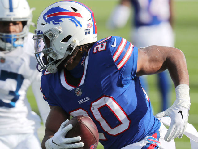 Buffalo Bills running back Zack Moss (20) plays against the