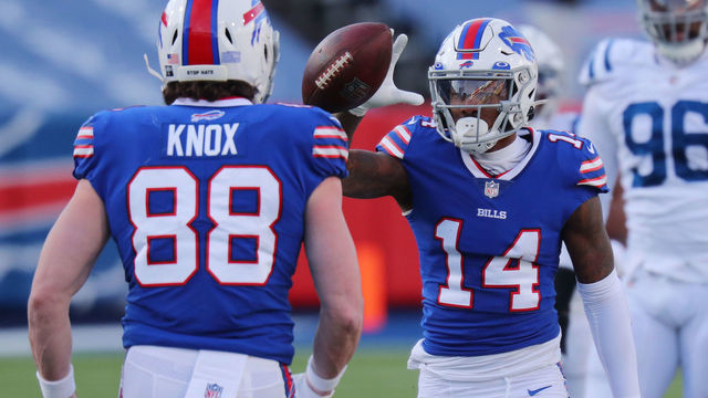 ORCHARD PARK, NEW YORK - JANUARY 09: Stefon Diggs #14 reacts with Dawson Knox #88 of the Buffalo Bills after making a first-down reception during the second half of the AFC Wild Card playoff game against the Indianapolis Colts at Bills Stadium on January 09, 2021 in Orchard Park, New York.
