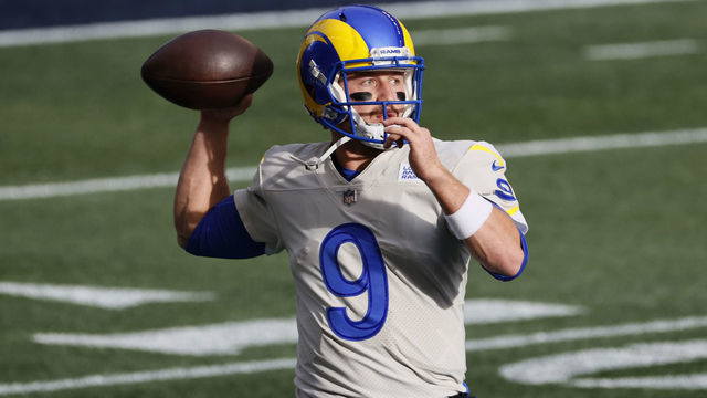 SEATTLE, WASHINGTON - JANUARY 09: Quarterback John Wolford #9 of the Los Angeles Rams warms up prior to the NFC Wild Card Playoff game against the Seattle Seahawks at Lumen Field on January 09, 2021 in Seattle, Washington.