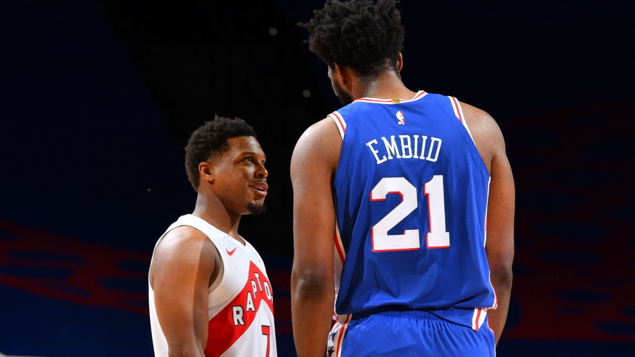 PHILADELPHIA, PA - DECEMBER 29: Kyle Lowry #7 of the Toronto Raptors and Joel Embiid #21 of the Philadelphia 76ers talk during the game on December 29, 2020 at the Wells Fargo Center in Philadelphia, Pennsylvania NOTE TO USER: User expressly acknowledges and agrees that, by downloading and/or using this Photograph, user is consenting to the terms and conditions of the Getty Images License Agreement. Mandatory Copyright Notice: Copyright 2020 NBAE