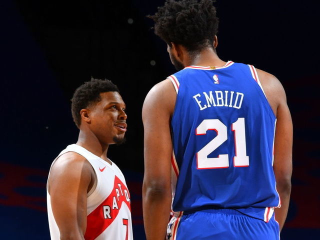 PHILADELPHIA, PA - DECEMBER 29: Kyle Lowry #7 of the Toronto Raptors and Joel Embiid #21 of the Philadelphia 76ers talk during the game on December 29, 2020 at the Wells Fargo Center in Philadelphia, Pennsylvania NOTE TO USER: User expressly acknowledges and agrees that, by downloading and/or using this Photograph, user is consenting to the terms and conditions of the Getty Images License Agreement. Mandatory Copyright Notice: Copyright 2020 NBAE