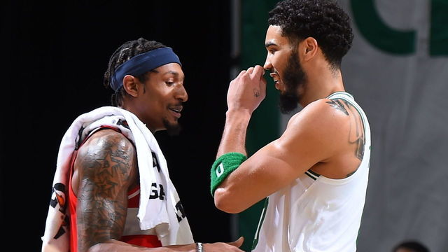 BOSTON, MA - JANUARY 8: Bradley Beal #3 of the Washington Wizards and Jayson Tatum #0 of the Boston Celtics talk after the game on January 8, 2021 at the TD Garden in Boston, Massachusetts. Mandatory Copyright Notice: Copyright 2021 NBAE