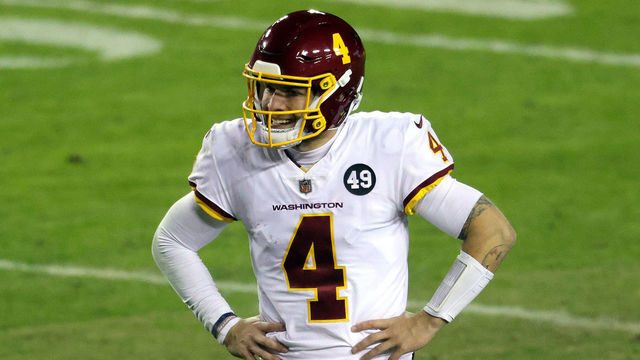 LANDOVER, MARYLAND - JANUARY 09: Quarterback Taylor Heinicke #4 of the Washington Football Team reacts after failing to convert on a third down during the 3rd quarter of the game against the Tampa Bay Buccaneers at FedExField on January 09, 2021 in Landover, Maryland.