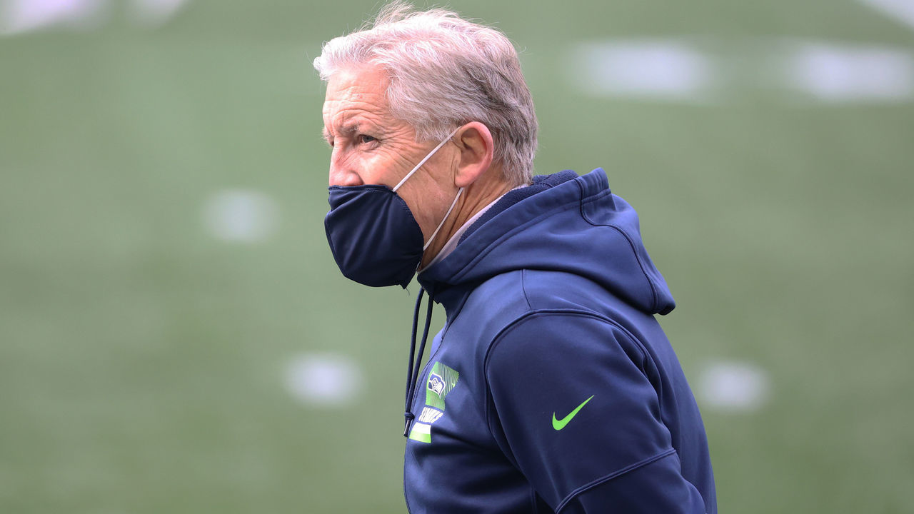 SEATTLE, WASHINGTON - JANUARY 09: Head coach Pete Carroll of the Seattle Seahawks looks on during warm ups prior to the NFC Wild Card Playoff game against the Los Angeles Rams at Lumen Field on January 09, 2021 in Seattle, Washington.