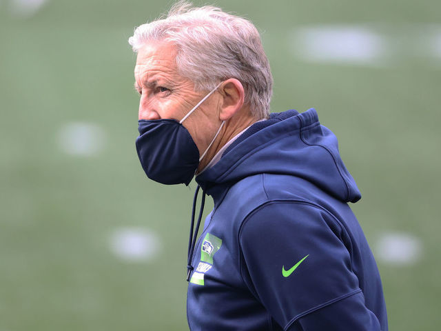 SEATTLE, WASHINGTON - JANUARY 09: Head coach Pete Carroll of the Seattle Seahawks looks on during warm ups prior to the NFC Wild Card Playoff game against the Los Angeles Rams at Lumen Field on January 09, 2021 in Seattle, Washington.