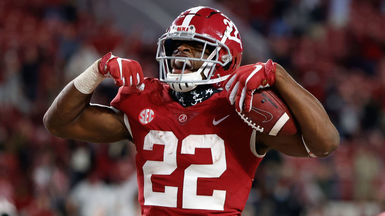 TUSCALOOSA, AL - OCTOBER 17: Najee Harris #22 of the Alabama Crimson Tide celebrates after diving into the endzone for a touchdown in the second half against the Georgia Bulldogs at Bryant-Denny Stadium on October 17, 2020 in Tuscaloosa, Alabama.