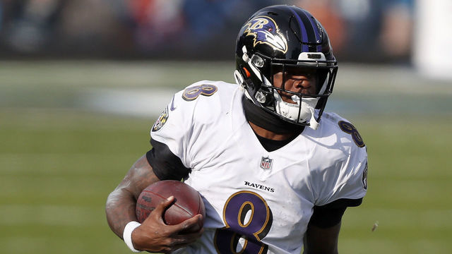 NASHVILLE, TENNESSEE - JANUARY 10: Quarterback Lamar Jackson #8 of the Baltimore Ravens carries the ball for yardage during the third quarter of their AFC Wild Card Playoff game against the Tennessee Titans at Nissan Stadium on January 10, 2021 in Nashville, Tennessee.