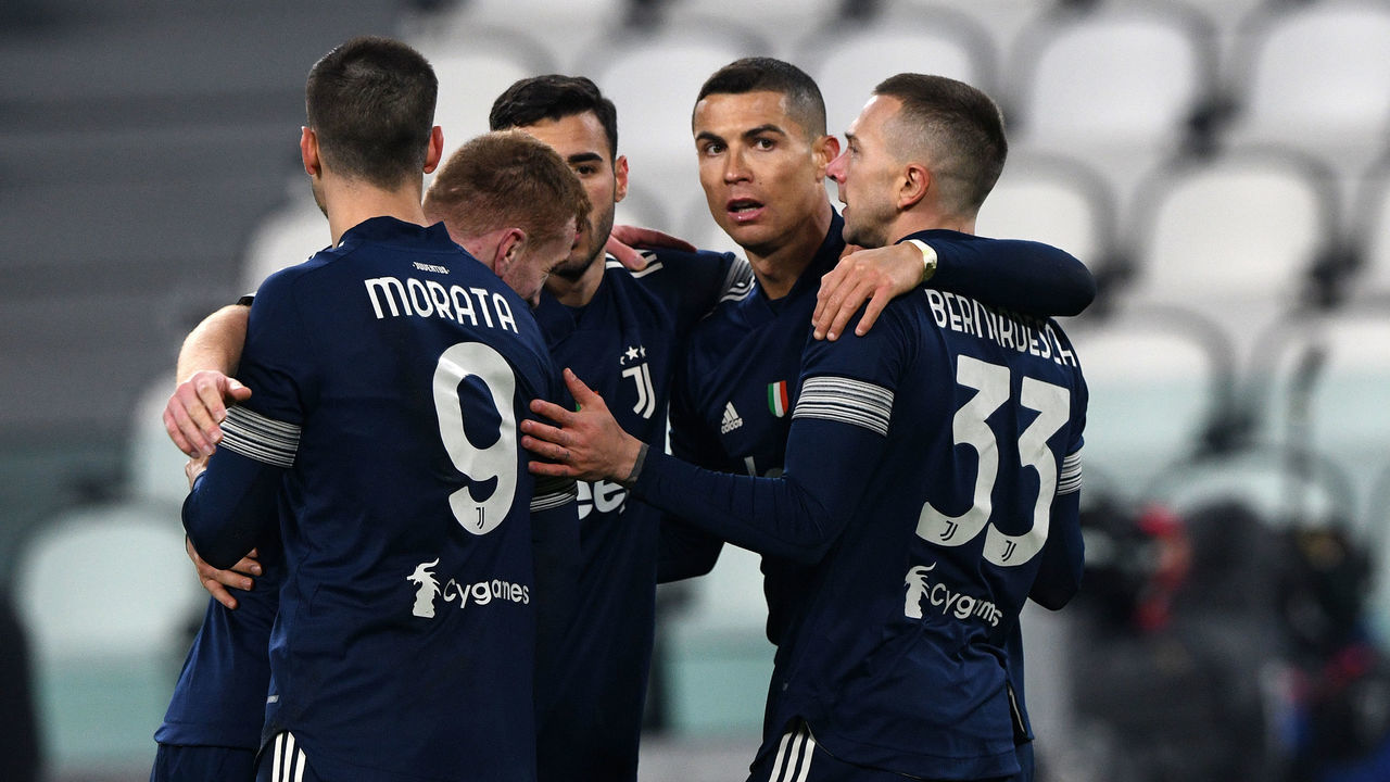 TURIN, ITALY - JANUARY 10: Cristiano Ronaldo of Juventus celebrates after scoring his team's third goal with teammates Gianluca Frabotta, Dejan Kulusevski, Alvaro Morata and Federico Bernardeschi during the Serie A match between Juventus and US Sassuolo at Allianz Stadium on January 10, 2021 in Turin, Italy. Sporting stadiums around Italy remain under strict restrictions due to the Coronavirus Pandemic as Government social distancing laws prohibit fans inside venues resulting in games being played behind closed doors.