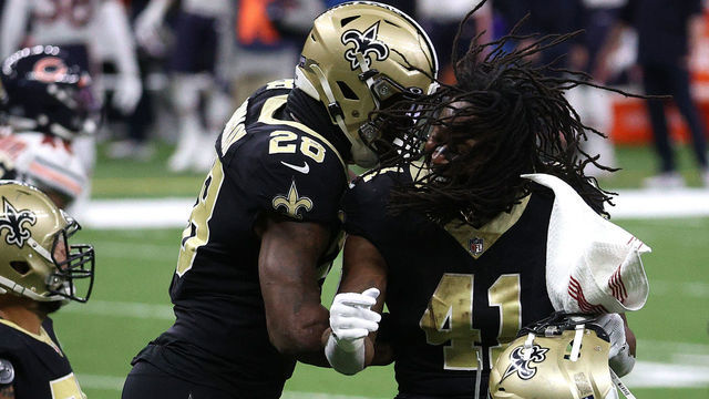 NEW ORLEANS, LOUISIANA - JANUARY 10: Latavius Murray #28 of the New Orleans Saints celebrates with Alvin Kamara #41 after scoring a six yard touchdown against the Chicago Bears during the third quarter in the NFC Wild Card Playoff game at Mercedes Benz Superdome on January 10, 2021 in New Orleans, Louisiana.