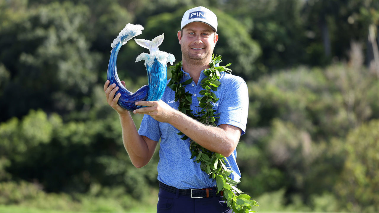 KAPALUA, HAWAII - JANUARY 10: Harris English of the United States poses with the trophy after defeating Joaquin Niemann of Chile (not pictured) in a playoff during the final round of the Sentry Tournament Of Champions at the Kapalua Plantation Course on January 10, 2021 in Kapalua, Hawaii.