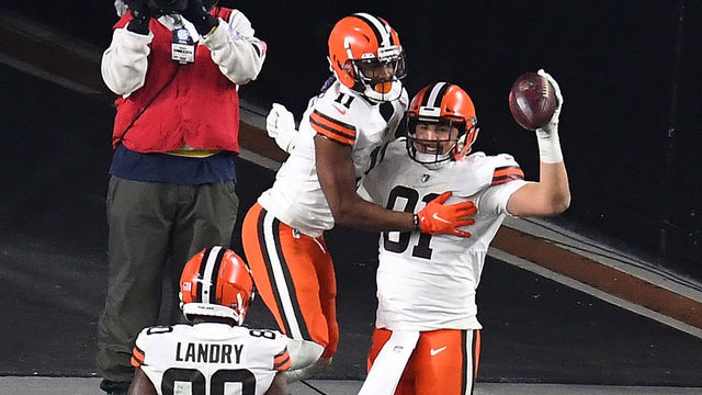 PITTSBURGH, PENNSYLVANIA - JANUARY 10: Austin Hooper #81 of the Cleveland Browns celebrates a touchdown with Donovan Peoples-Jones #11 during the first half of the AFC Wild Card Playoff game against the Pittsburgh Steelers at Heinz Field on January 10, 2021 in Pittsburgh, Pennsylvania.